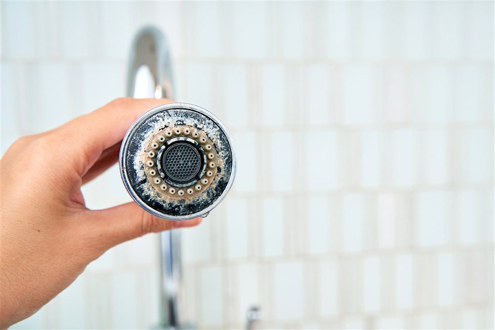welke schade richt hard water aan in huis